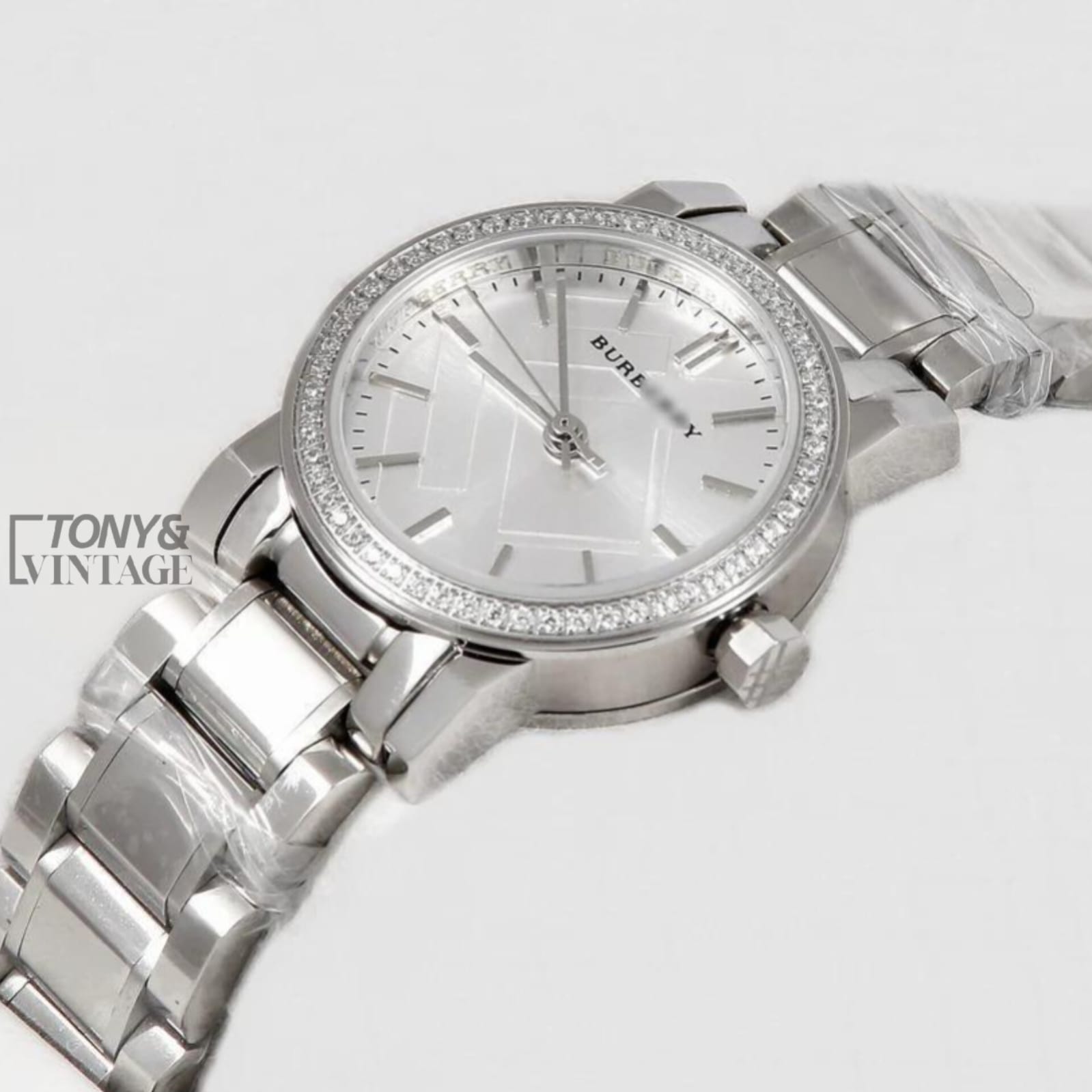 All-Silver-With-Stone-Bezel-Ladies-Watch1.jpeg