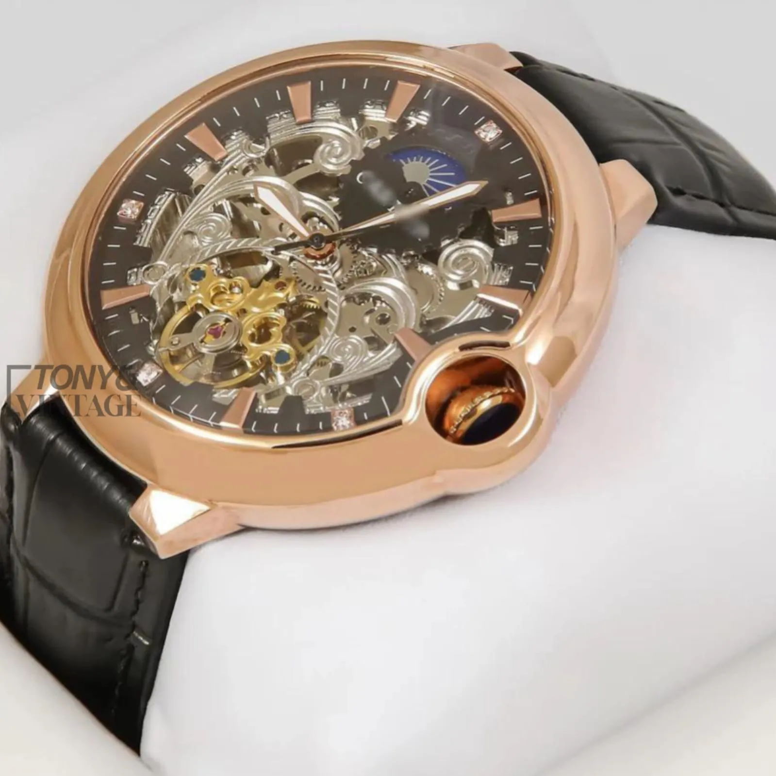Ballon-Bleu-Moon-Phase-Rose-Gold-Watch-With-Skeleton-Dial-and-Leather-Strap-1.webp