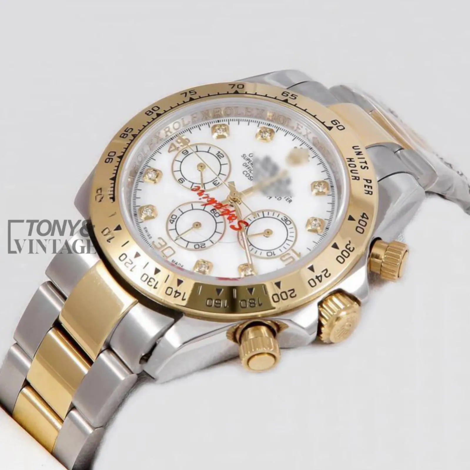 Chronograph-40-Two-Tone-Yellow-Gold-White-Dial1.webp