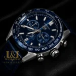 Chronograph Silver Case Watch with Deep Blue Dial, Bezel, and Leather Strap