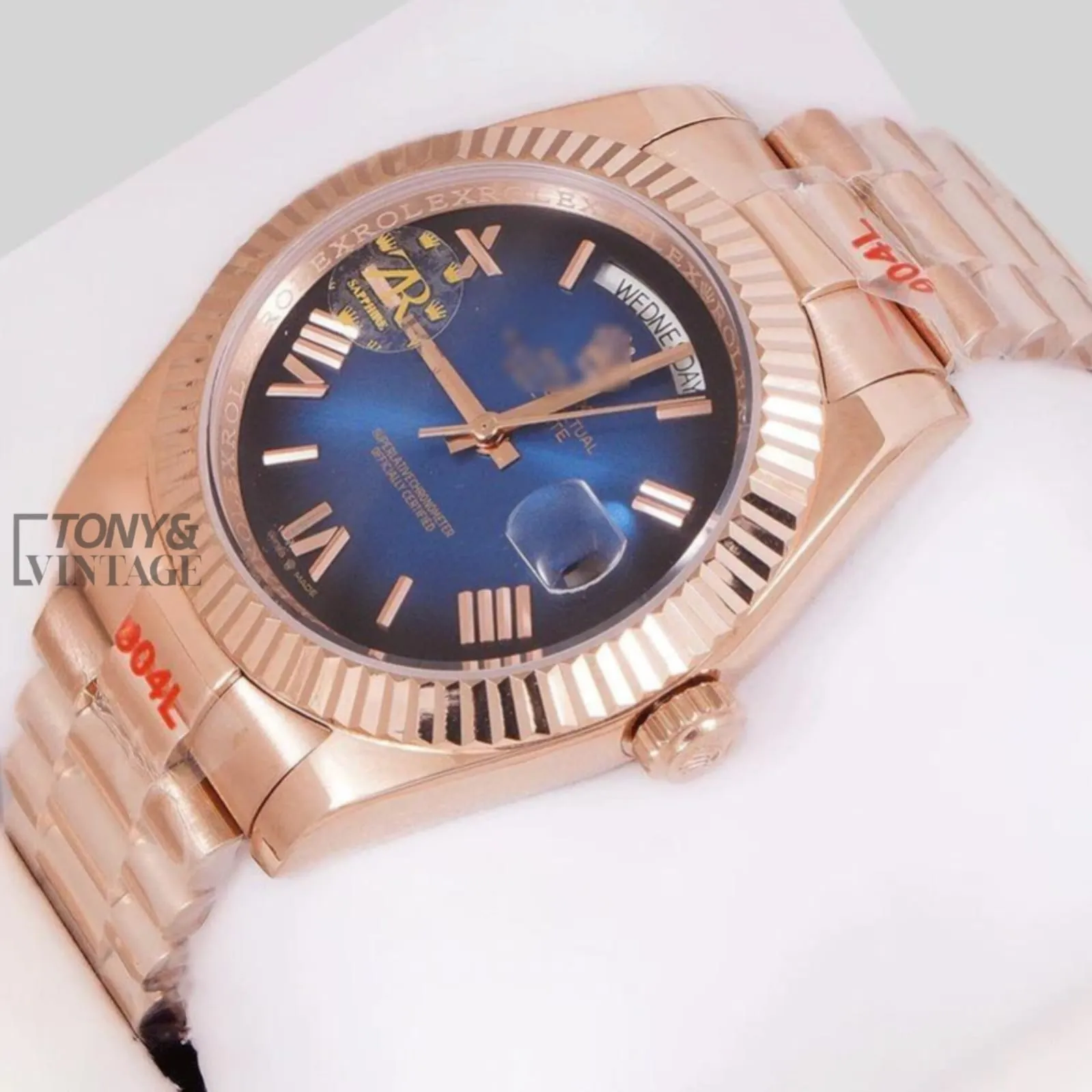 Rose-Gold-Dark-Blue-Dial-Fluted-Bezel1.webp
