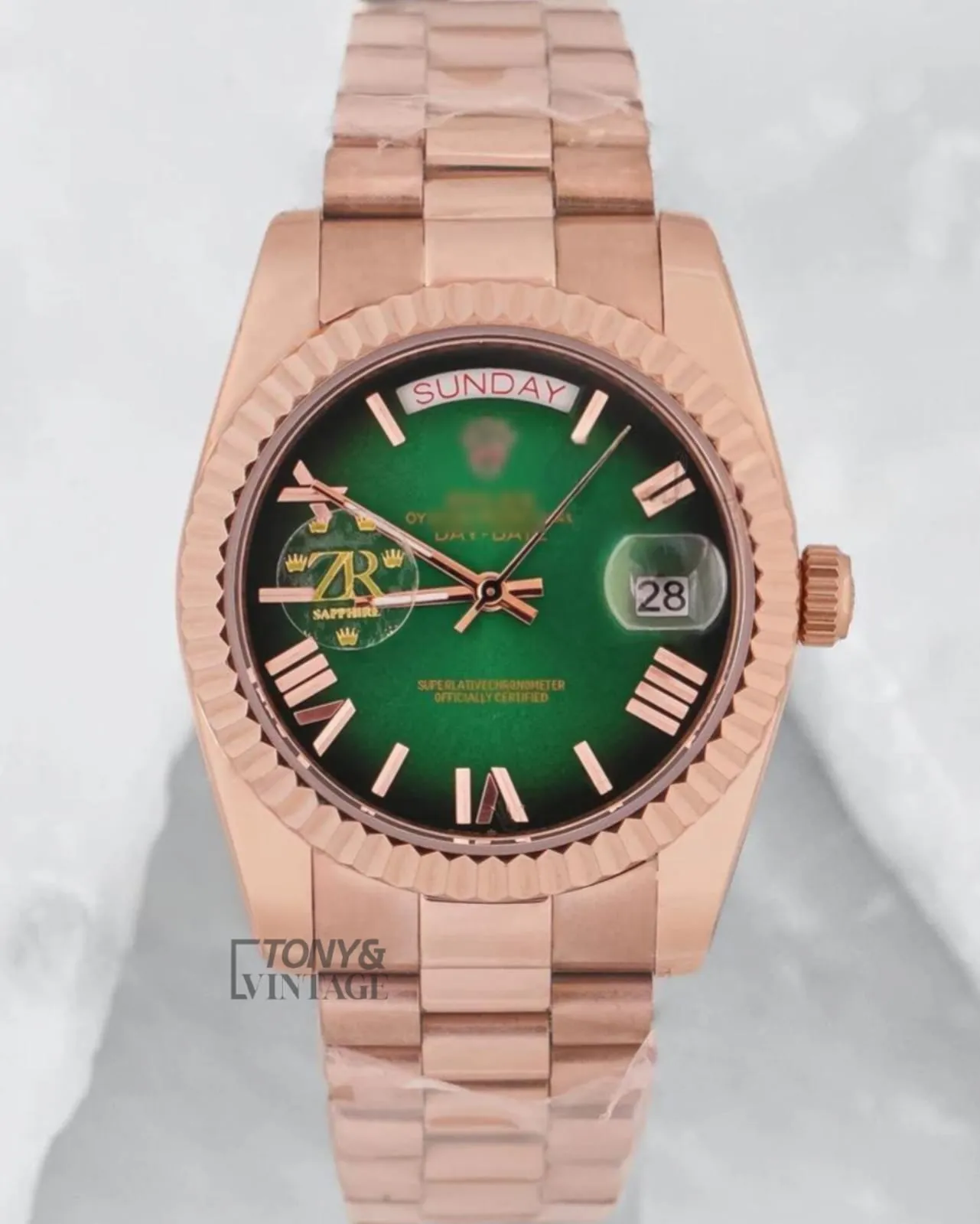Rose-Gold-Green-Dial-Fluted-Bezel1.webp