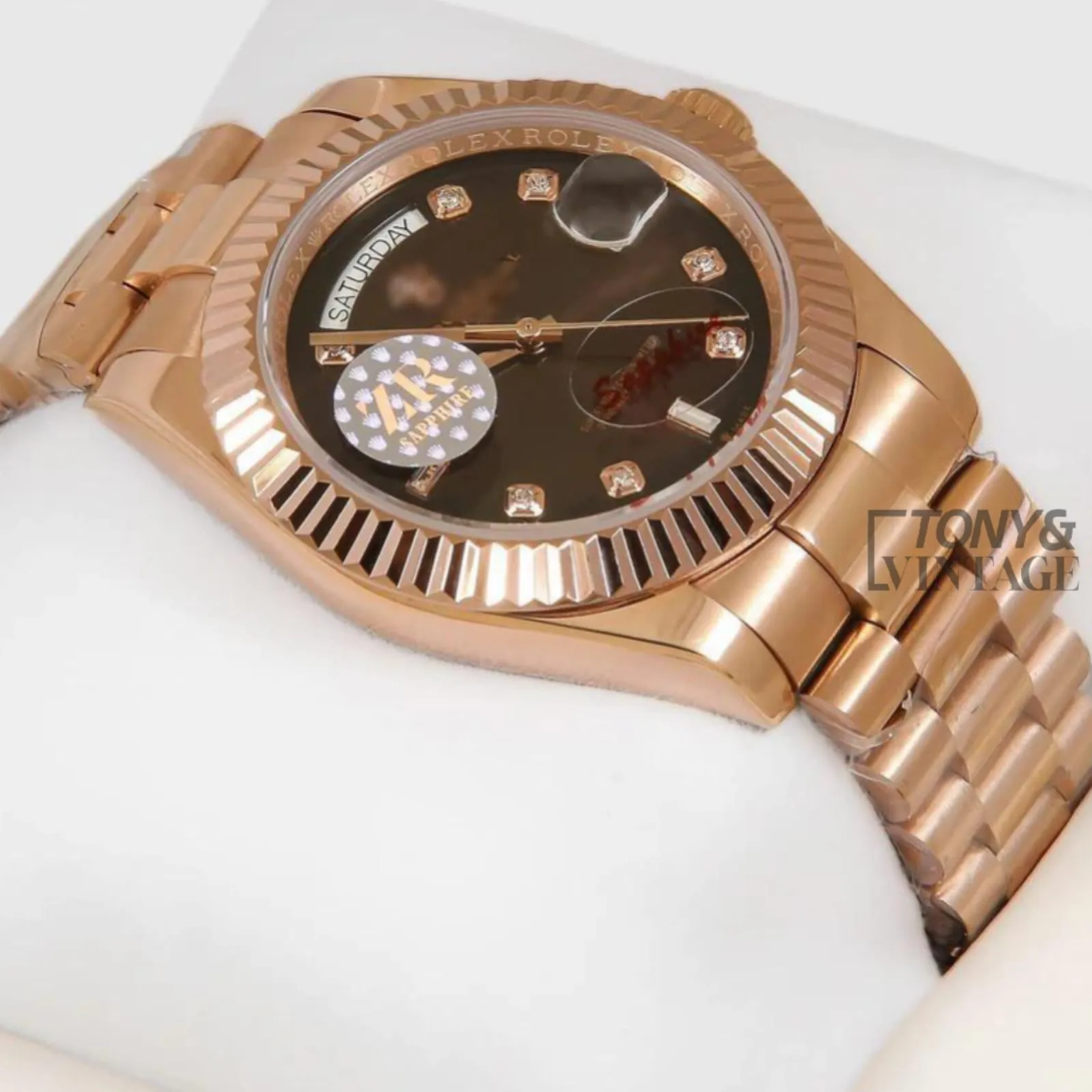 Rose Gold Watch with Chocolate Brown Dial, Stone Numerals, and Fluted Bezel