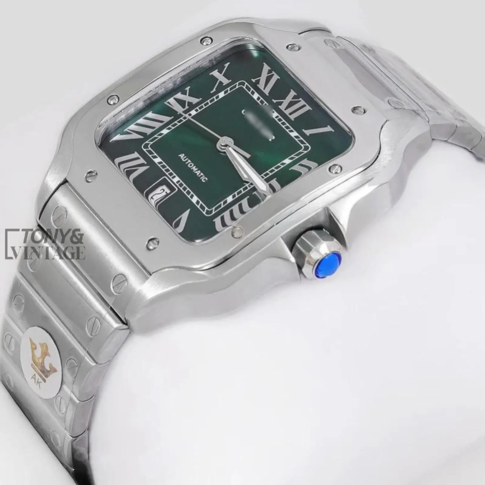 Silver-Automatic-Watch-with-Green-Dial-and-Roman-Numerals-1.webp