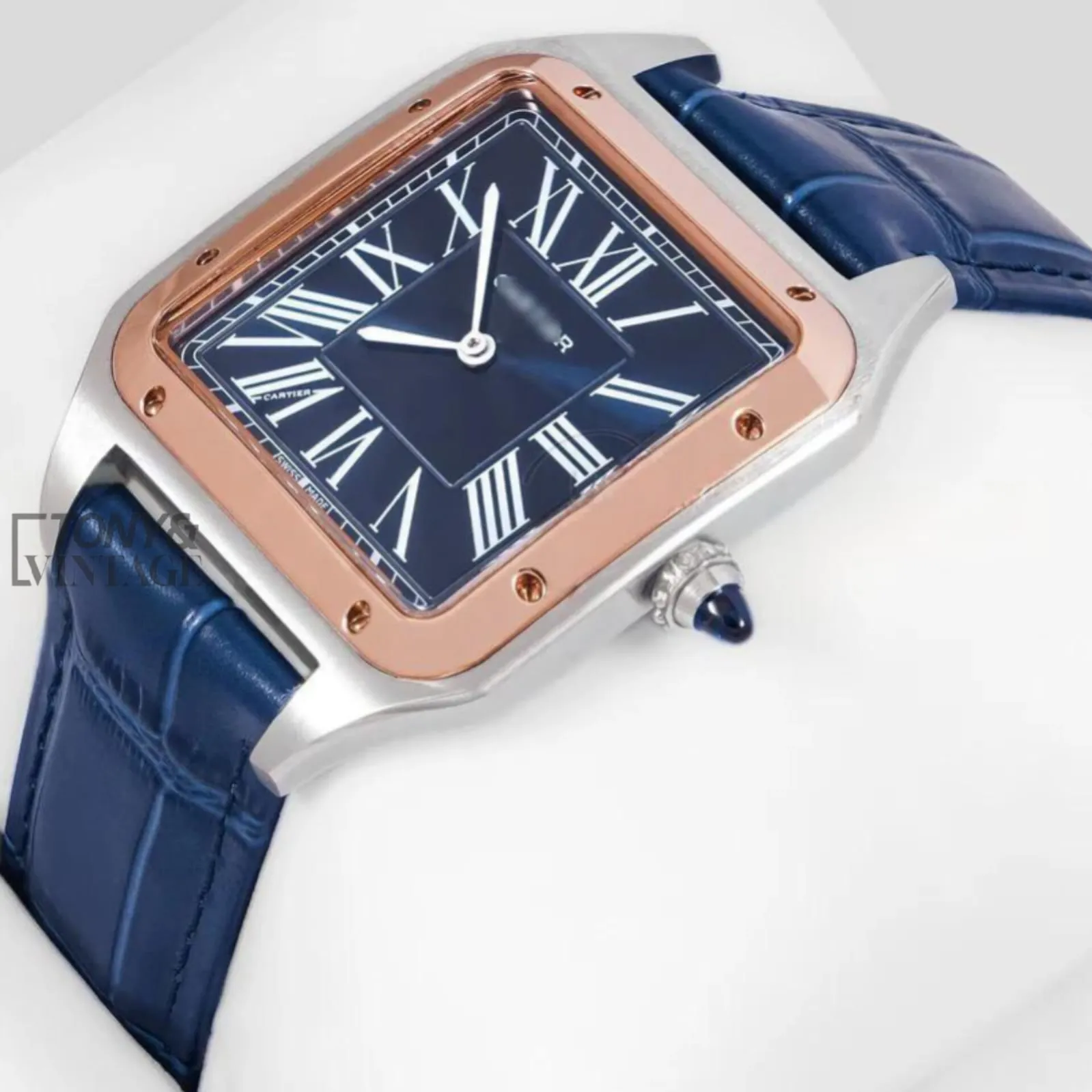 Silver-Case-with-Rose-Gold-Bezel-and-Blue-Leather-Strap-1.webp