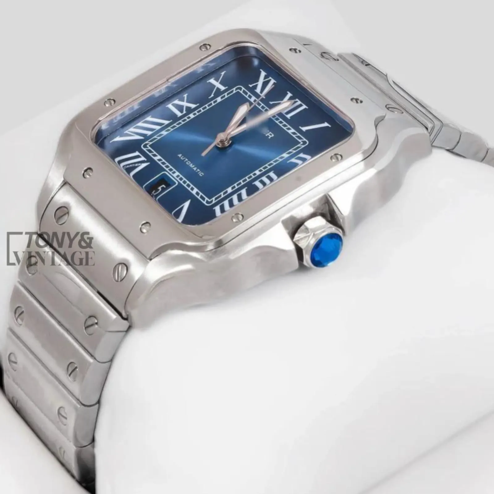 Silver-Watch-With-Blue-Dial-and-Roman-Numerals-1.webp