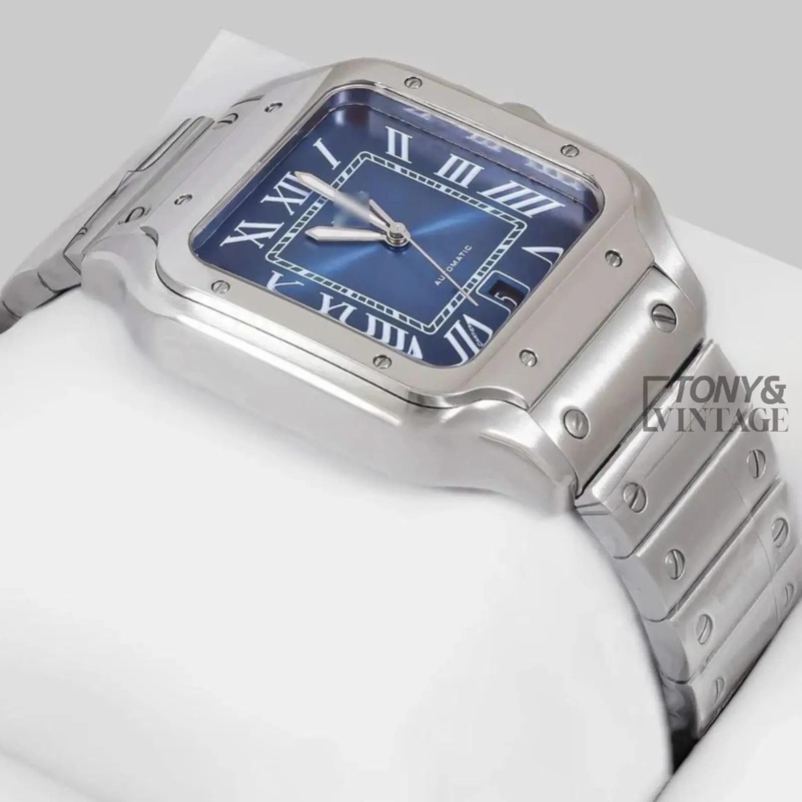 Silver Watch With Blue Dial and Roman Numerals