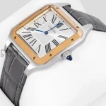 Silver Watch with Gold Bezel, Dial, and Leather Strap