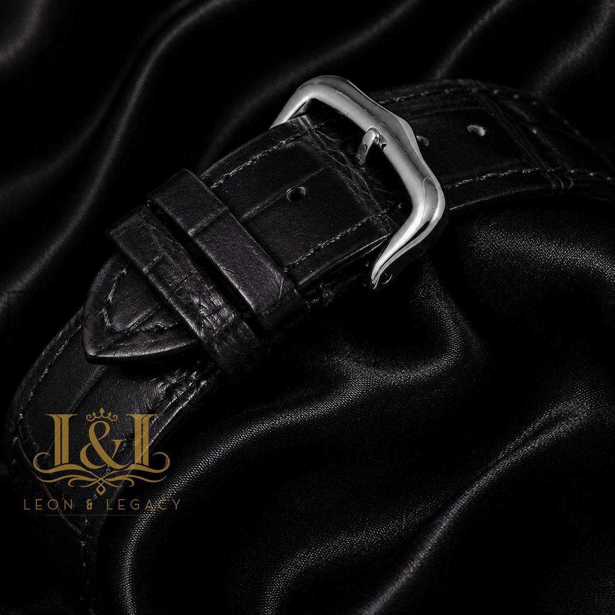 Silver Watch with Gold Bezel, Dial, and Leather Strap