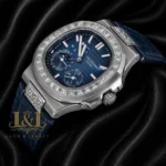 Silver Watch with Stone Bezel, Blue Dial, and Leather Strap