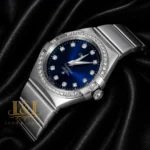 Silver With Blue Dial Stone Figure & Bezel Ladies Watch