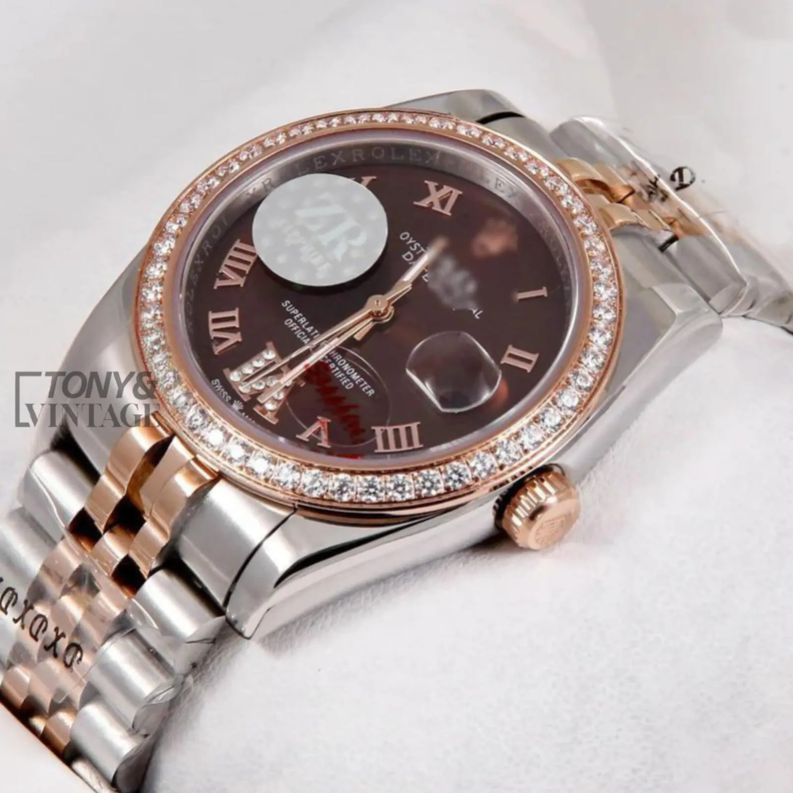 Two-Tone-Rose-Gold-Roman-Numeral-Stone-Bezel1.webp
