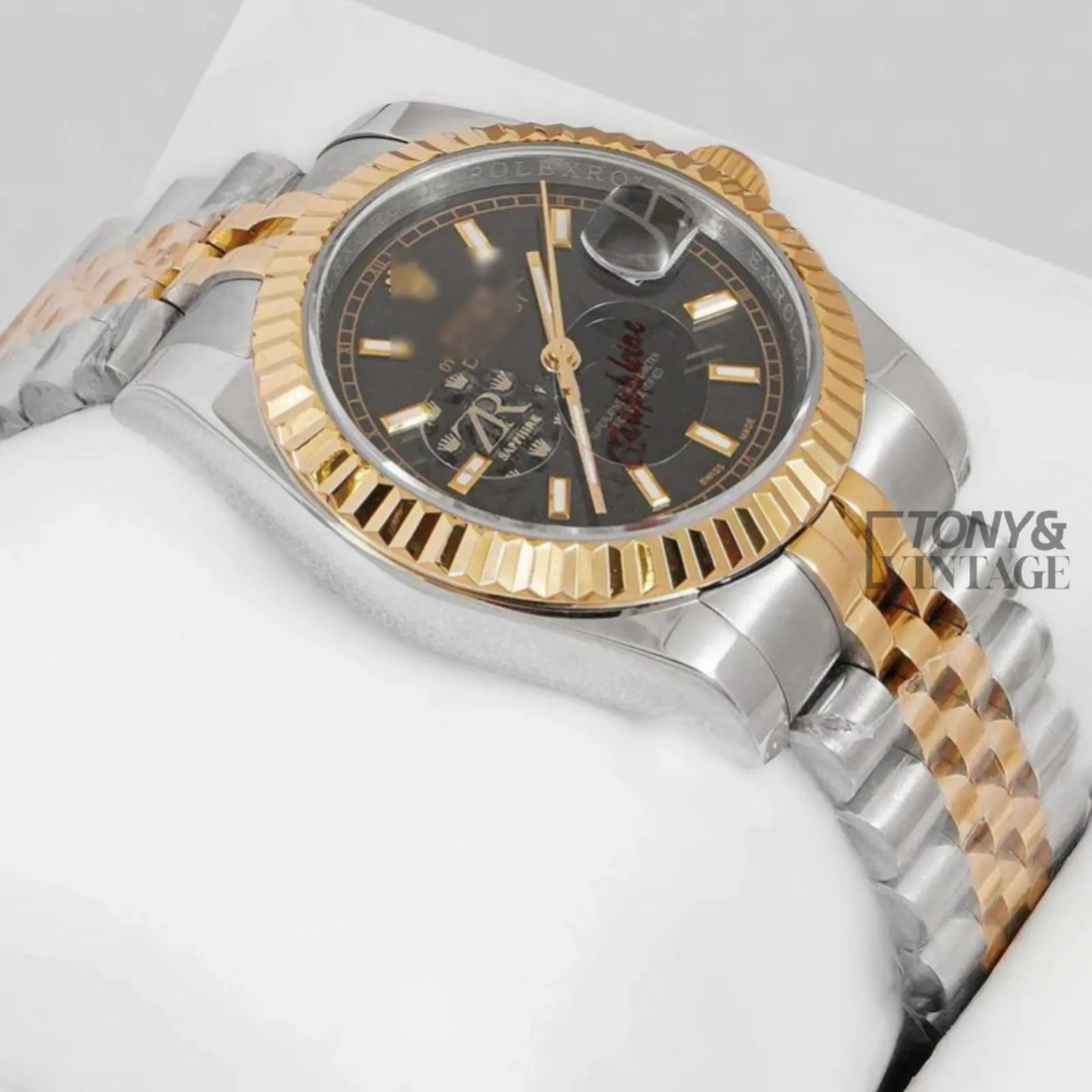 Two-Tone Yellow Gold Automatic Watch with Black Dial and Fluted Bezel