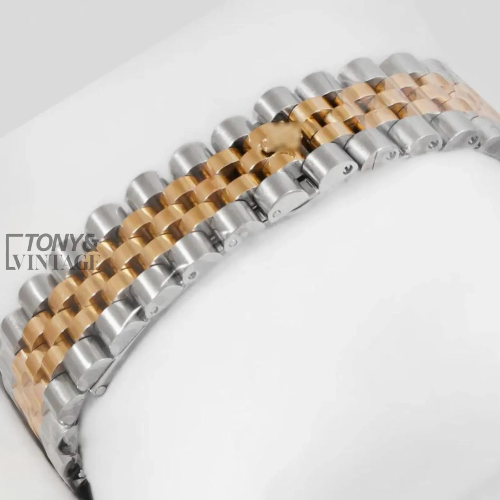 Two-Tone Yellow Gold Automatic Watch with Black Dial and Fluted Bezel