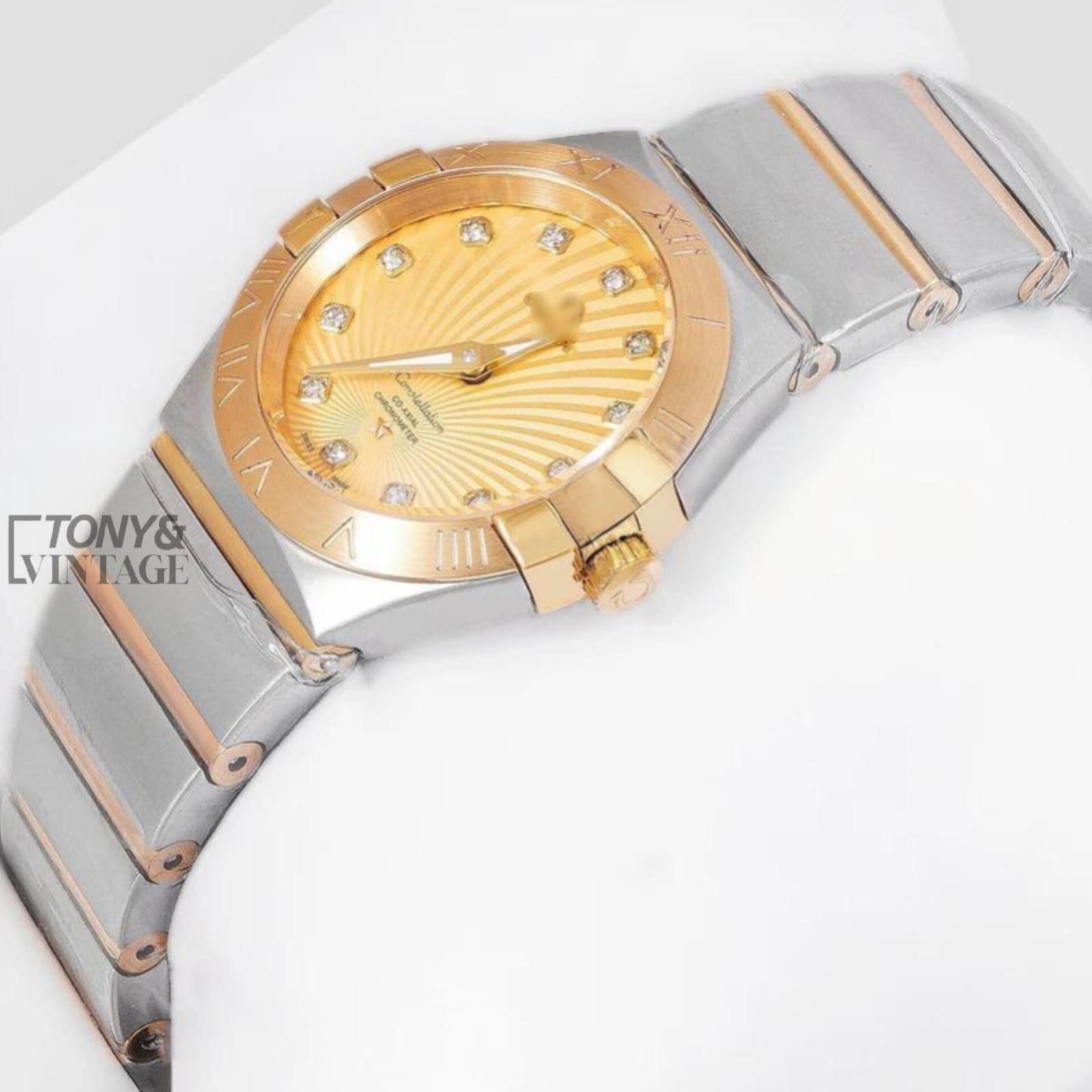 Two-Tone-Yellow-Gold-With-Dial-Stone-Figure-Ladies-Watch1.jpeg