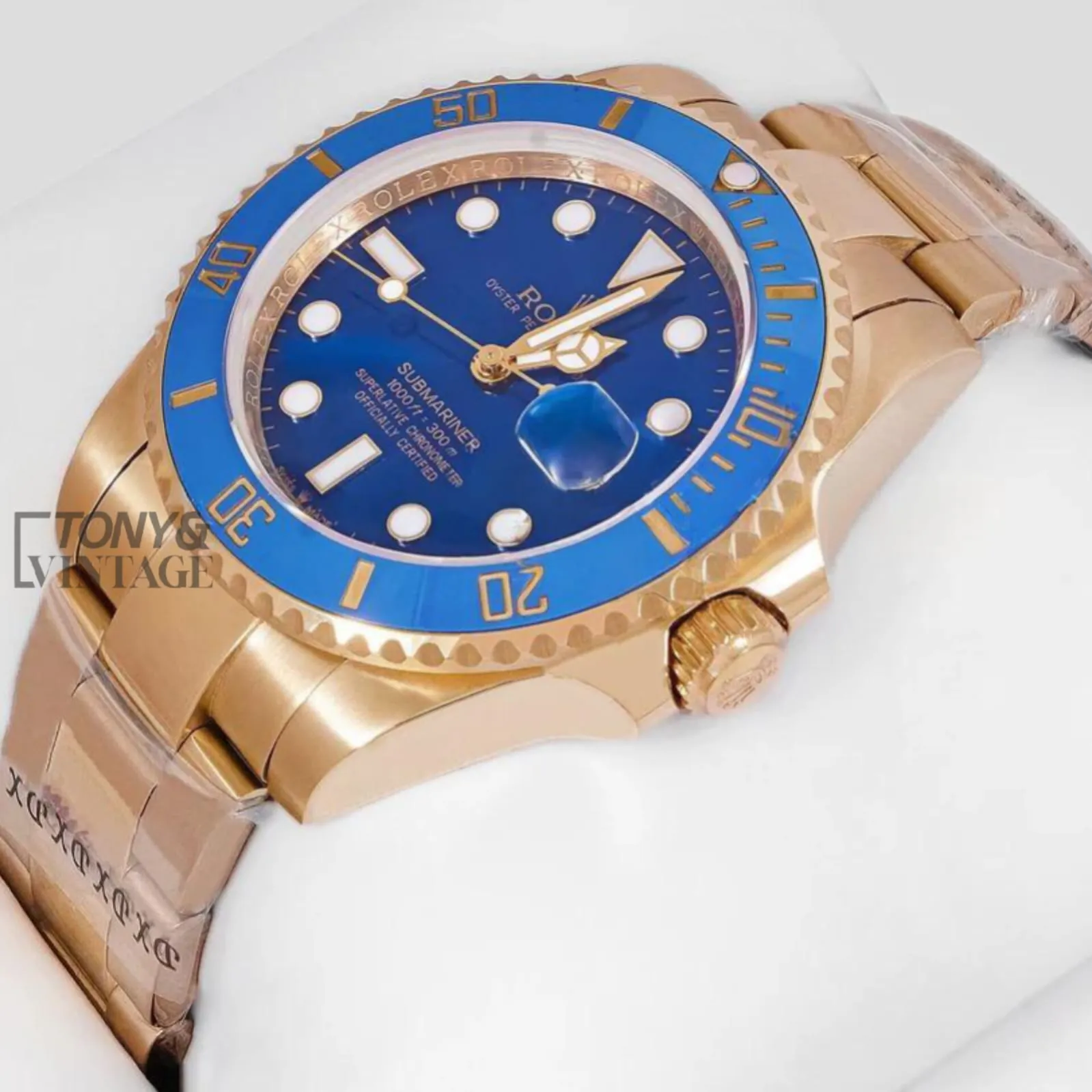 Yellow-Gold-Blue-Dial-Bezel-Watch1.webp