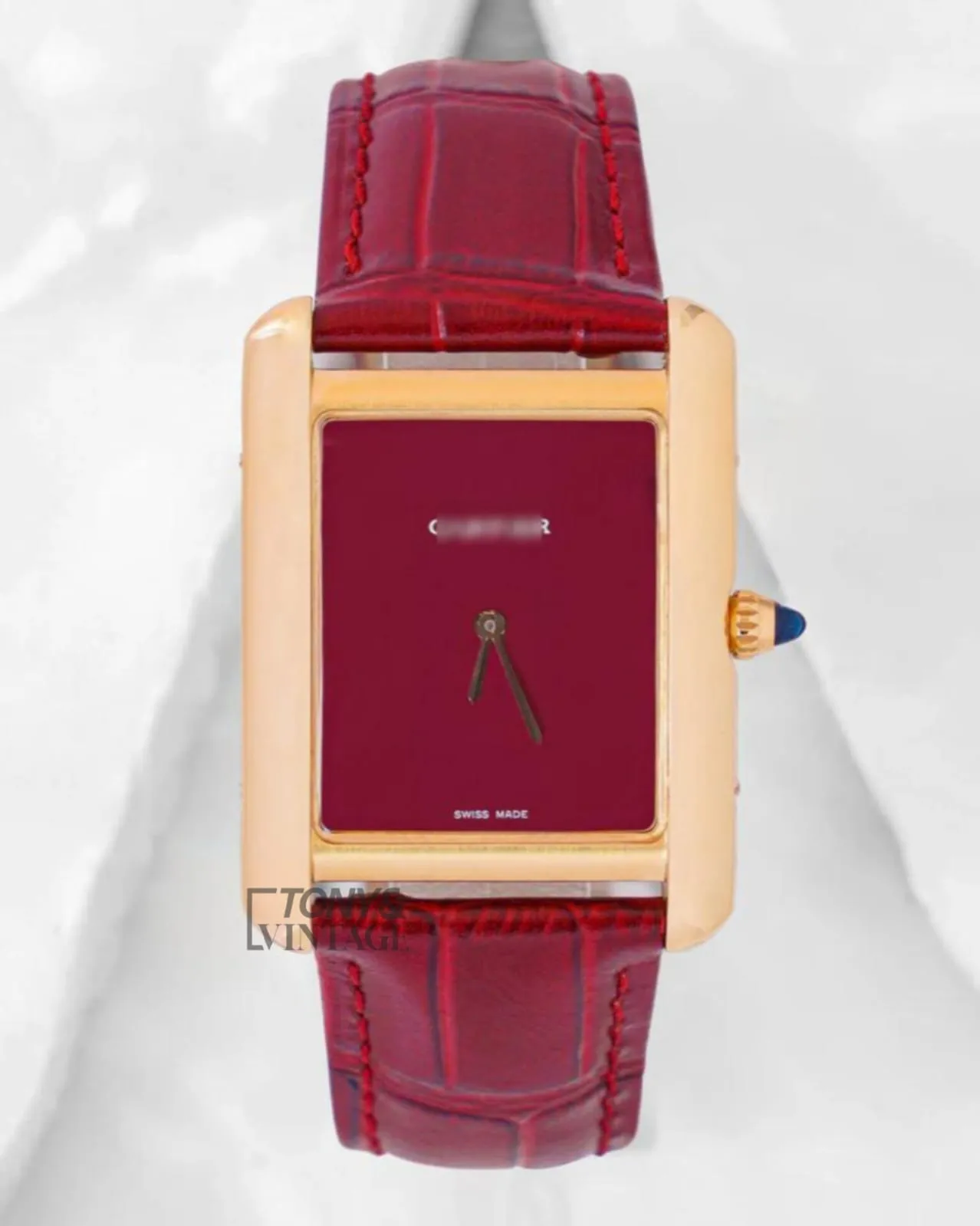 Yellow-Gold-Watch-with-Maroon-Dial-and-Leather-Strap.webp